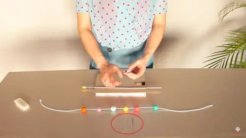 How to make holes in felt balls